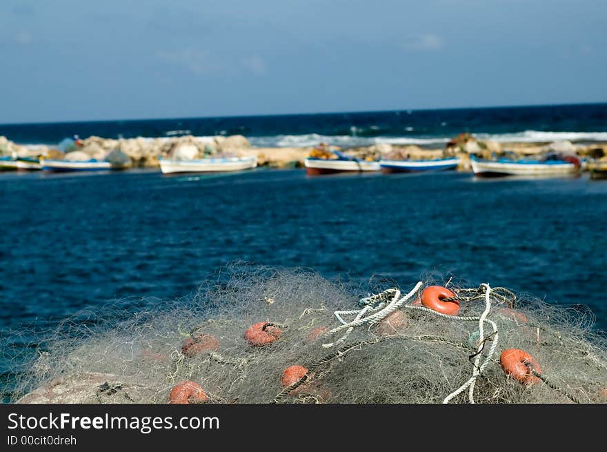 Fishermen net lying in port at the sea