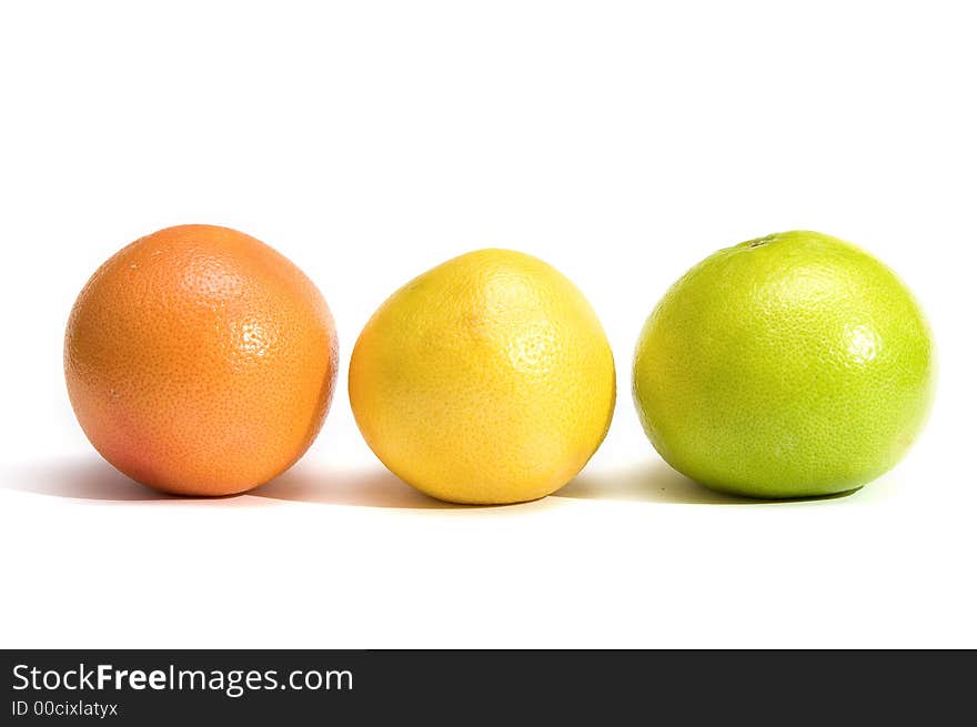 Orange and two grapefruits