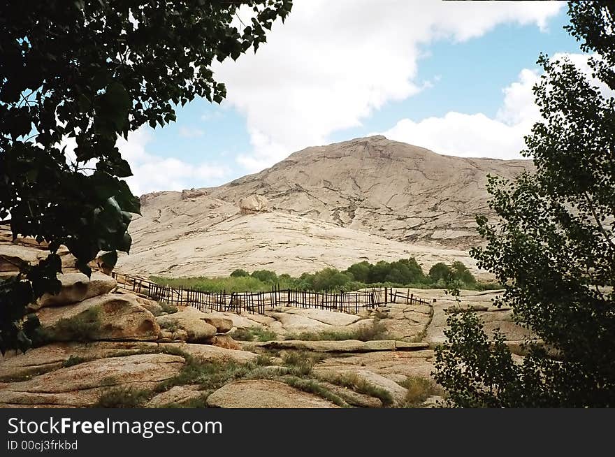 The height of mountain is equal 1100 meters. Granite monolith. The height of mountain is equal 1100 meters. Granite monolith.