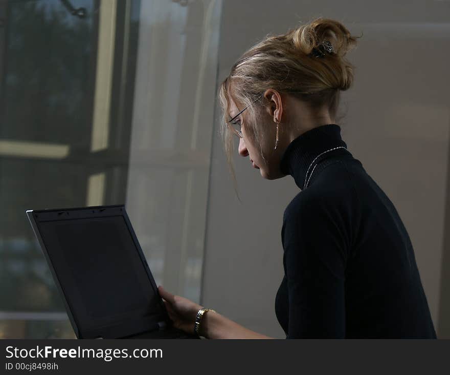 Young attractive beautiful lady with notebook. Young attractive beautiful lady with notebook