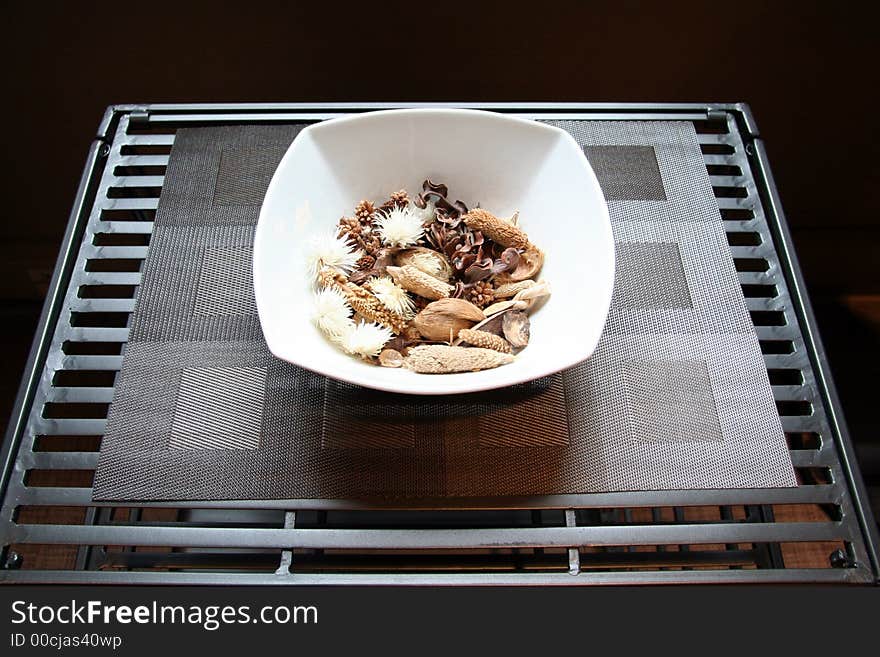 Ornamental Bowl with Potpourri on Metal Desk