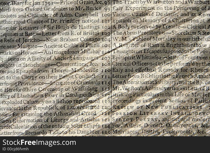 Old text over burnt wood texture