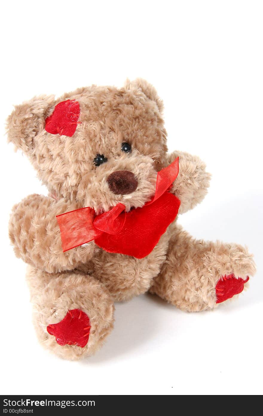 Brown Teddy Bear with hearts on white background. Brown Teddy Bear with hearts on white background