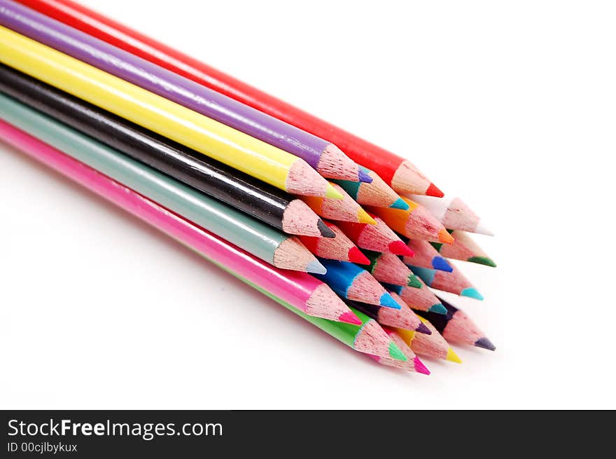 Bundle of multi colored pencils on a white background. Bundle of multi colored pencils on a white background