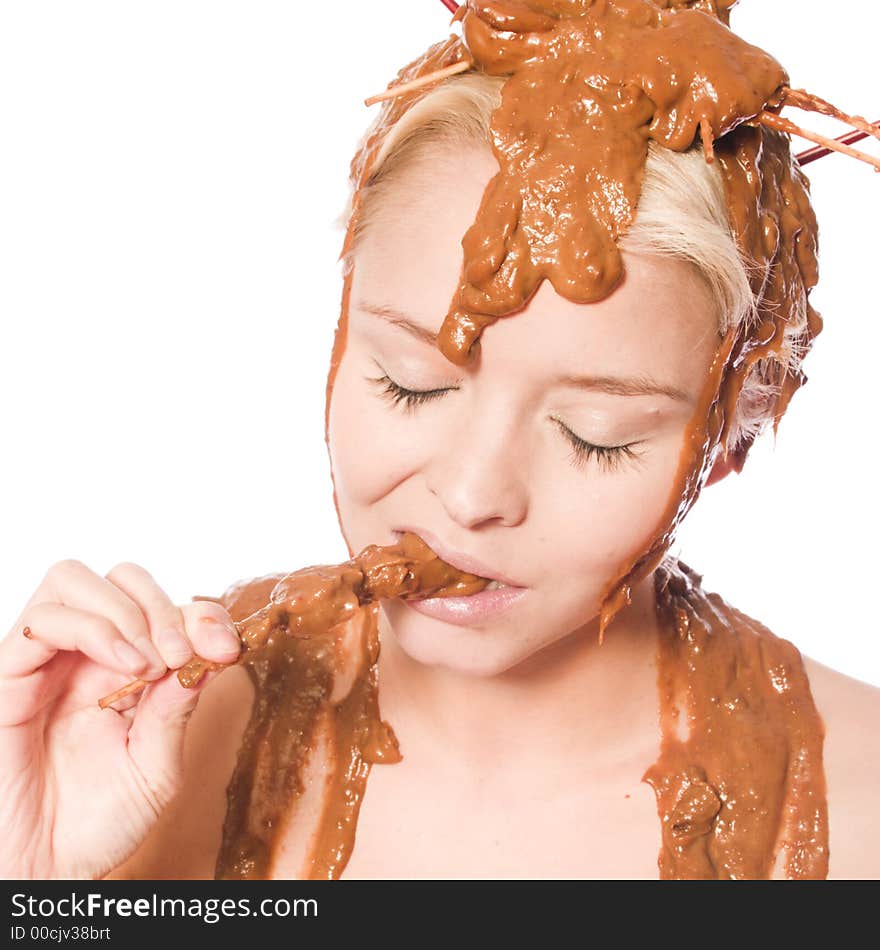 A model portrait in the studio covered with sateh ( asian food ). A model portrait in the studio covered with sateh ( asian food )