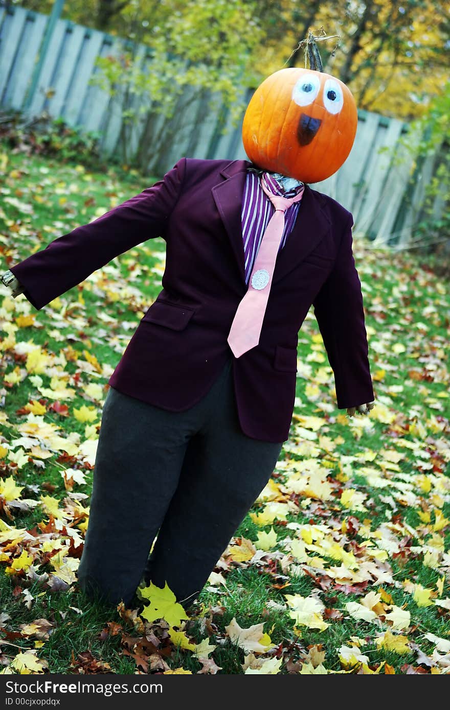 Pumpkin person in a suit