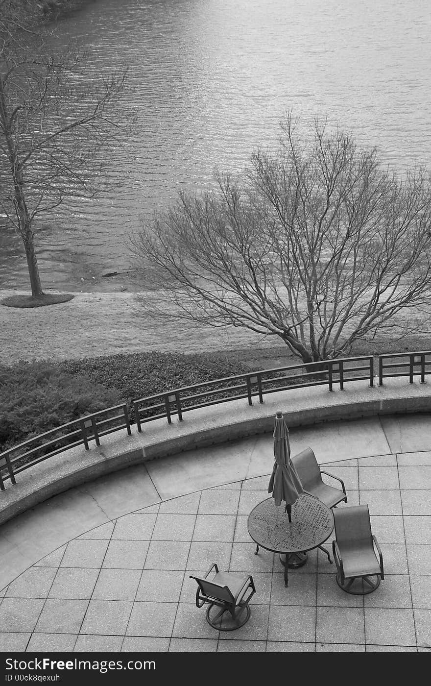 This photo is of an dining area on a patio. This photo is of an dining area on a patio.