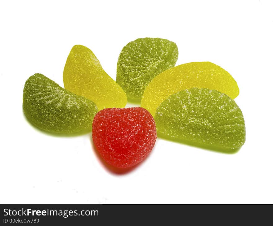 Close-up red green and yellow sweets isolated on white. Close-up red green and yellow sweets isolated on white