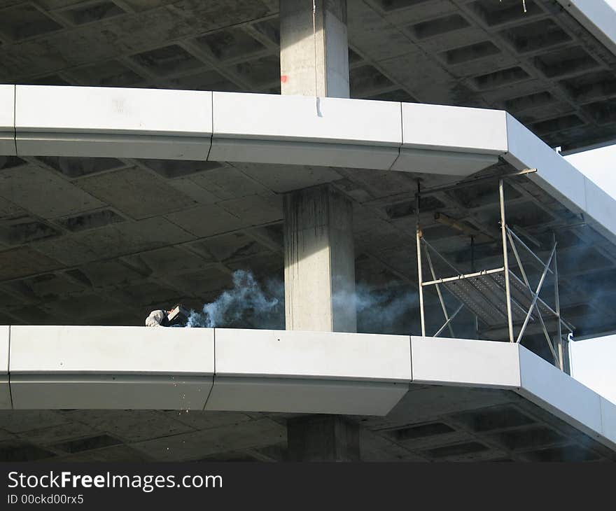 Welder working on a car park that is under construction in Istanbul. Welder working on a car park that is under construction in Istanbul