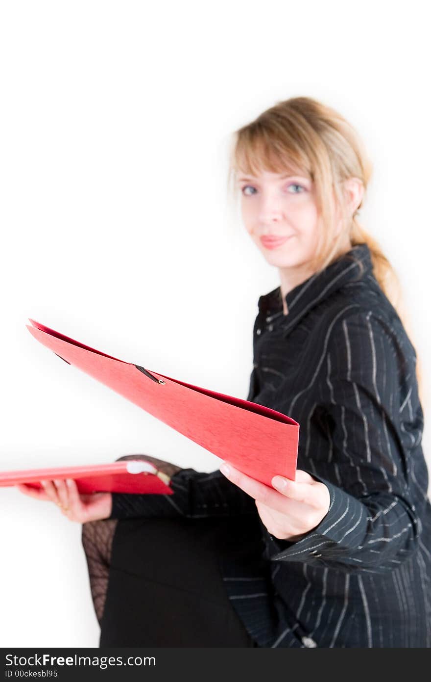 A red folder and a blond woman