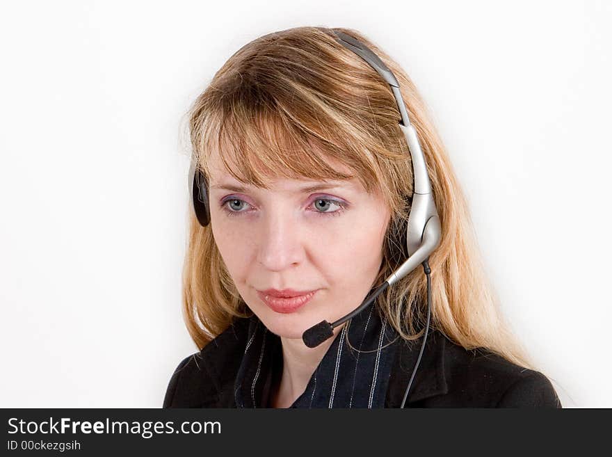 A smiling female receptionist isolated against a white background