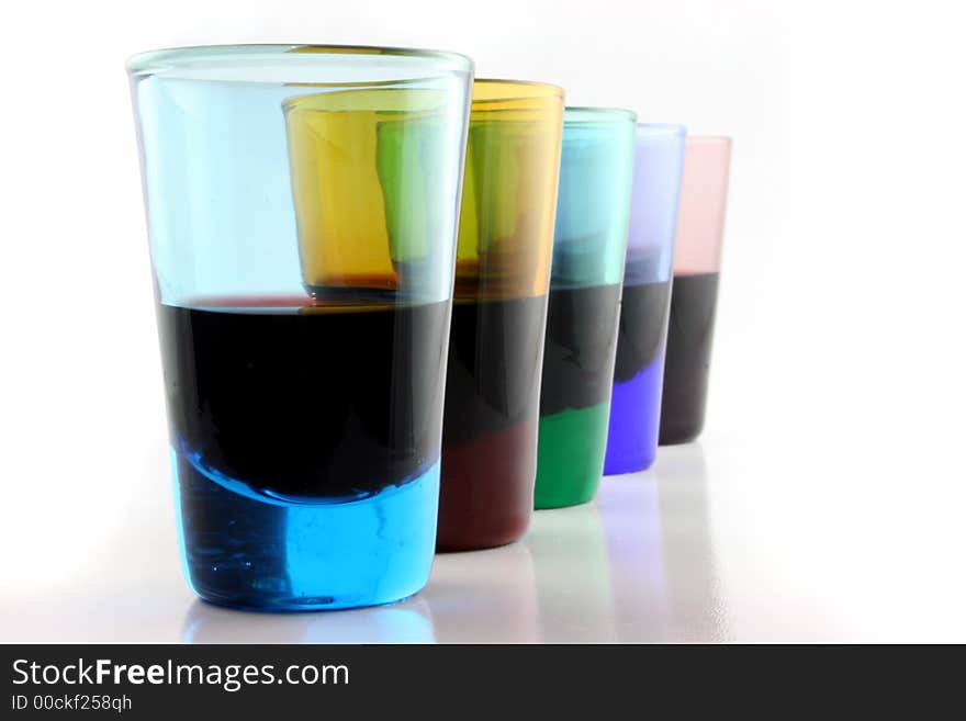 Close up of brightly colored drinking glasses. Close up of brightly colored drinking glasses