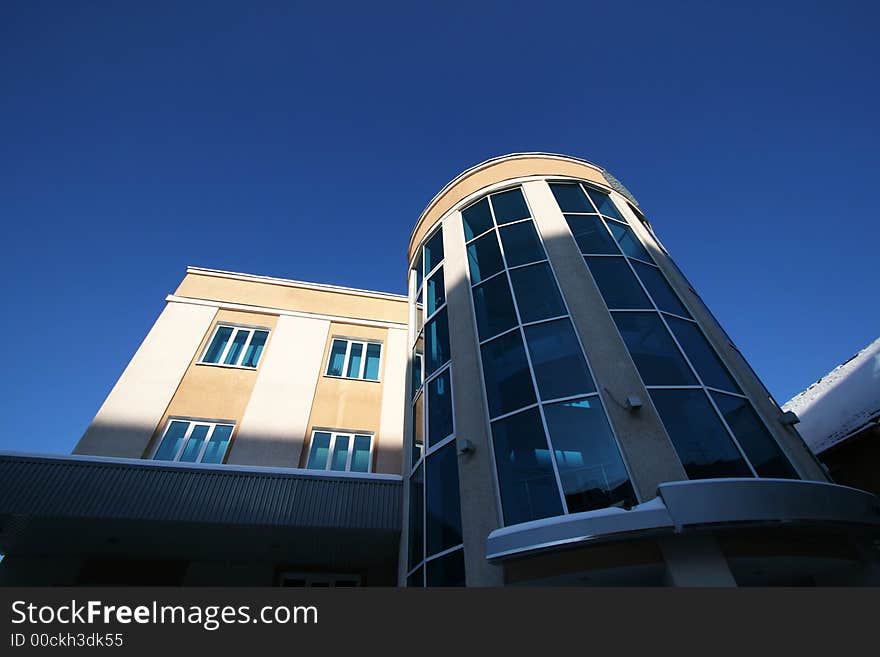 Modern building on a background of the dark blue sky