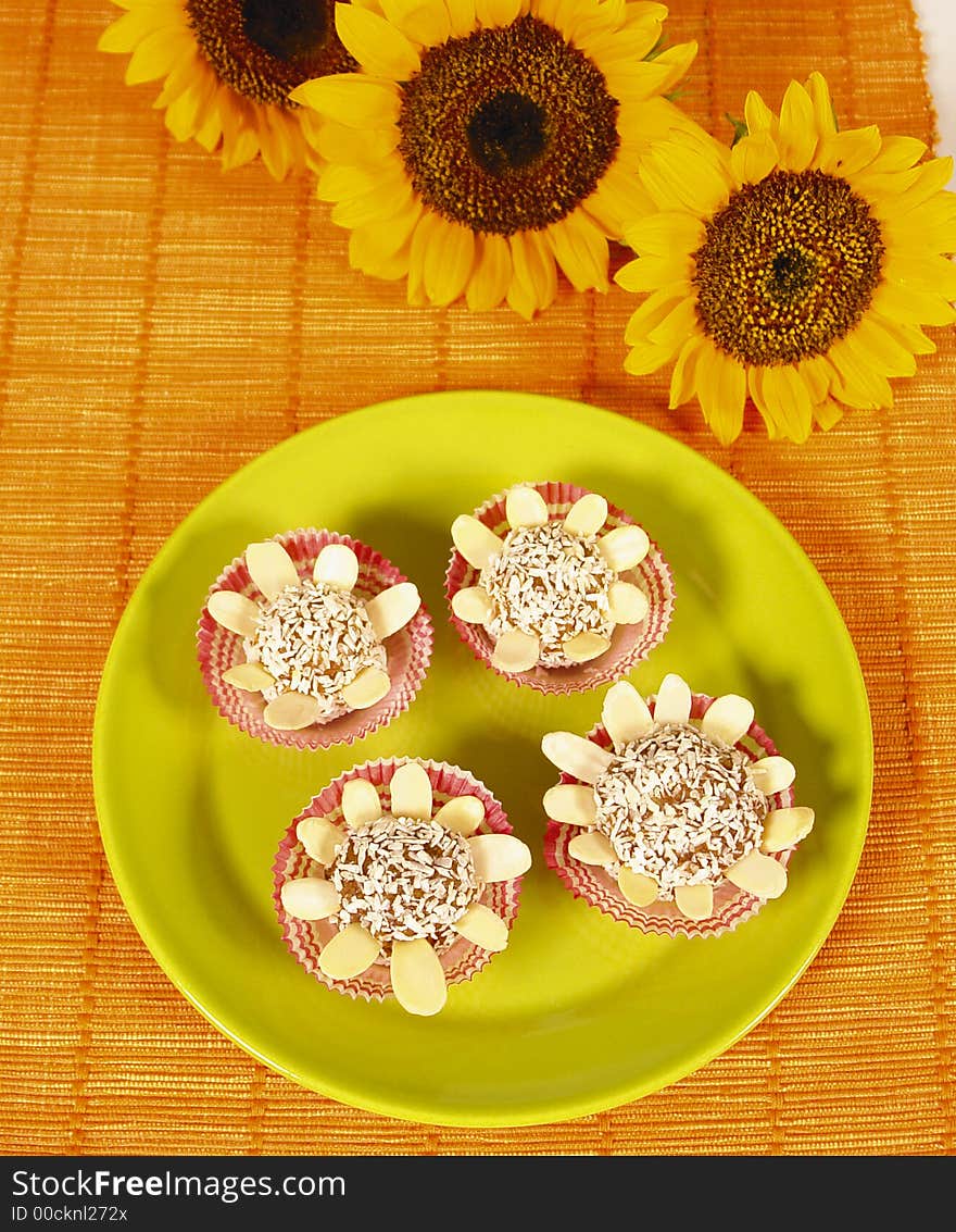 Cocount desert made from almonds and sunflower decoration. Cocount desert made from almonds and sunflower decoration