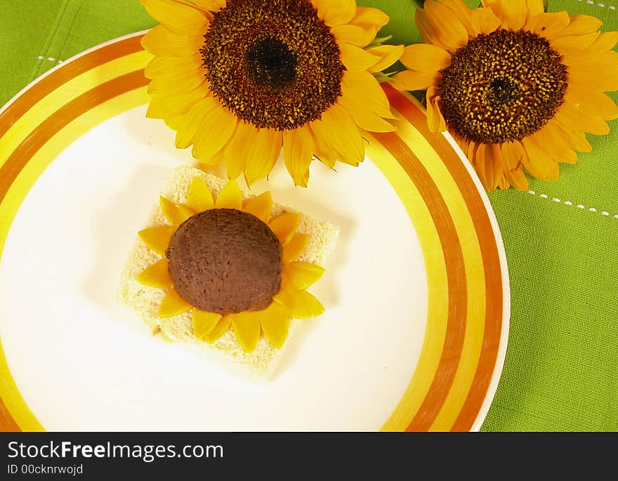 Black bean dip served as a sunflower on white bread and with cheese. Black bean dip served as a sunflower on white bread and with cheese