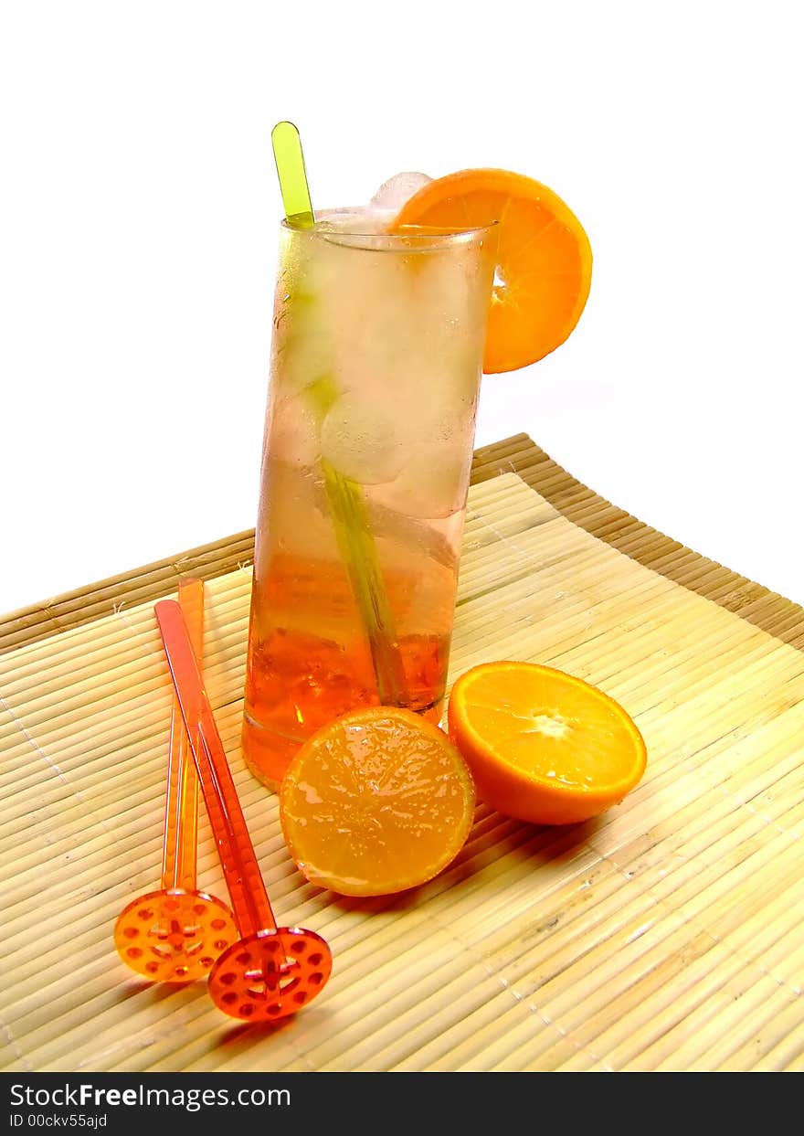 A colorful picture of a cocktail in a longdrink glass with some decoration at the side. A colorful picture of a cocktail in a longdrink glass with some decoration at the side