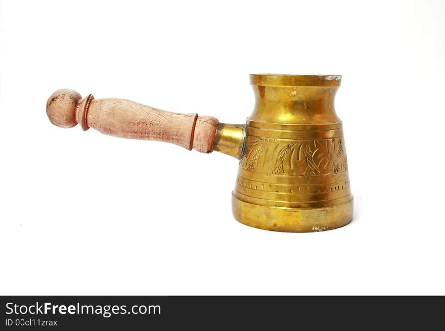 Old copper coffee pot with the wooden handle. Old copper coffee pot with the wooden handle