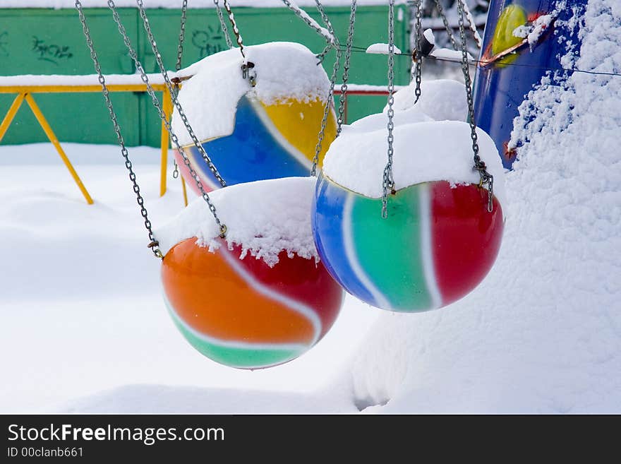 The roundabouts covered with a snow. The roundabouts covered with a snow