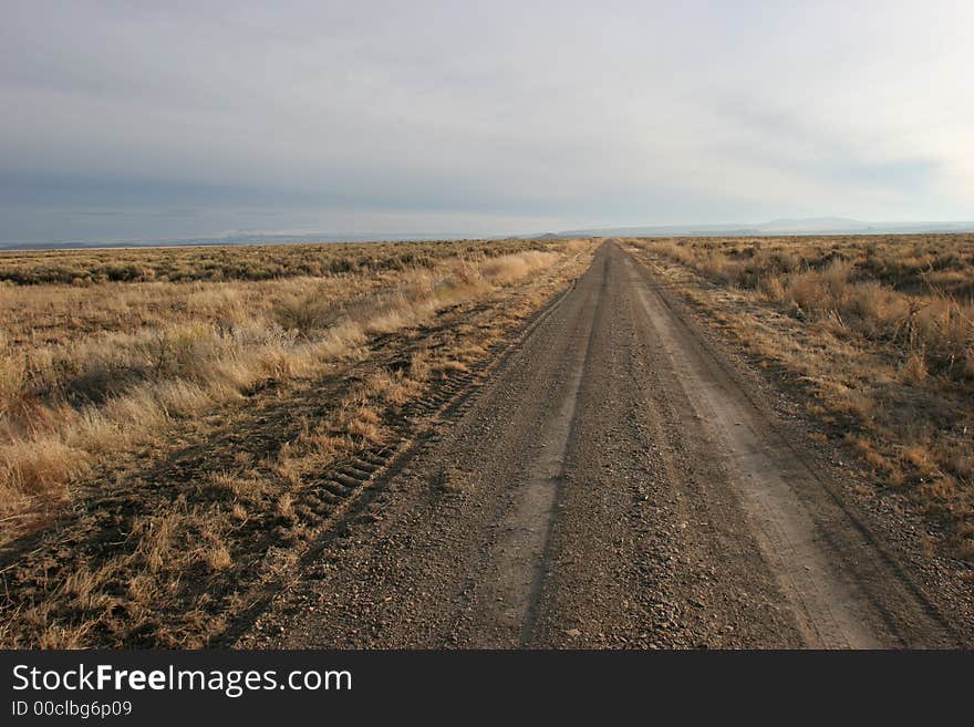 Gravel Road on a featureless landscape; clean, crisp, sharp image.