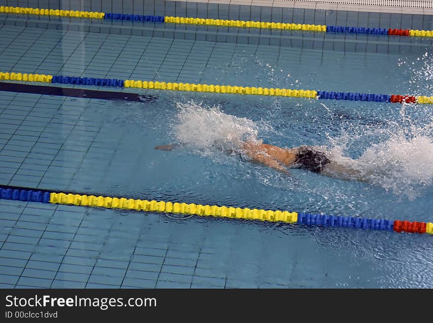 A swimmer in a swimming pool spa