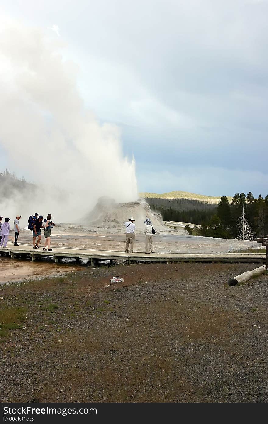 Erupting Geyser Near Tourists