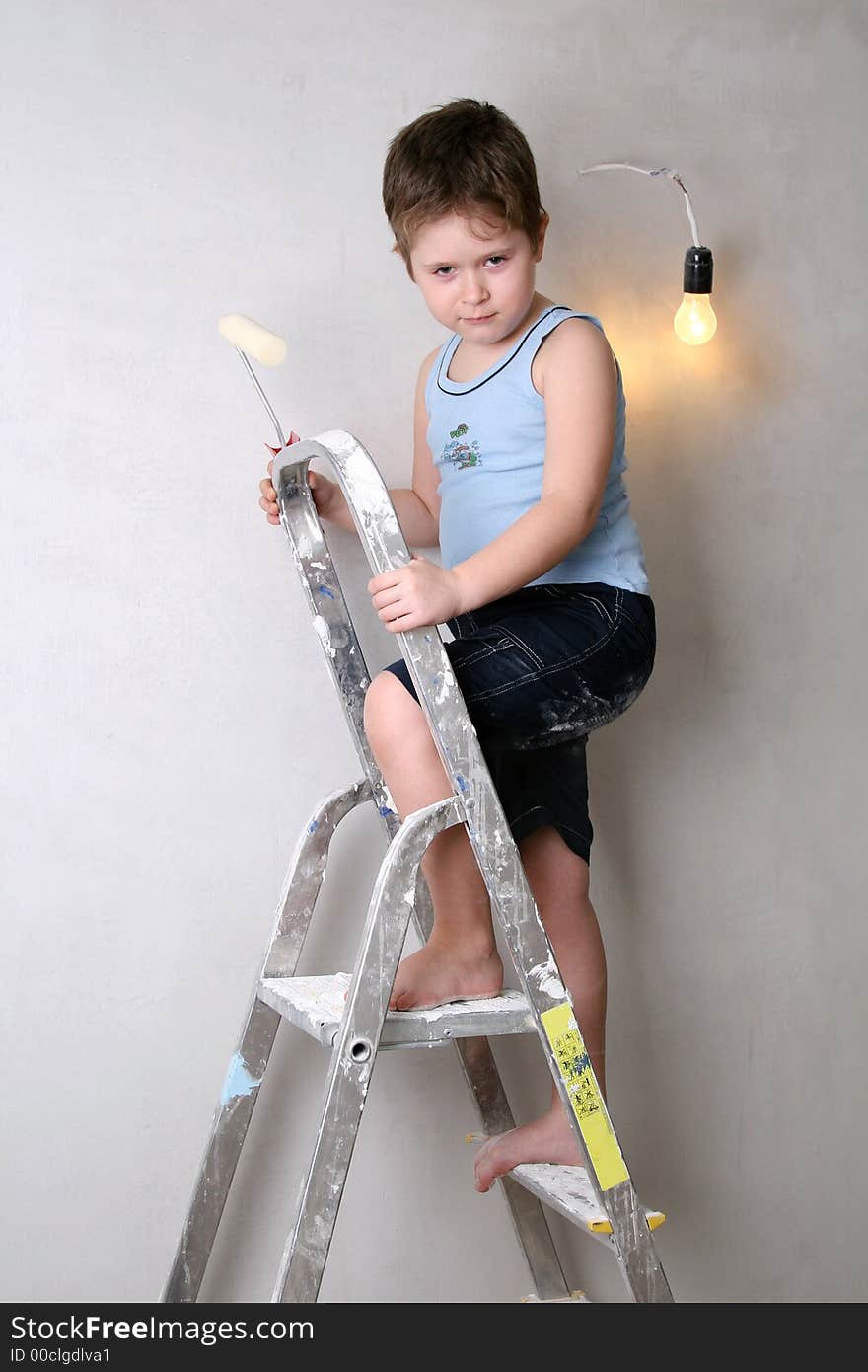 Boy with palette-knife near a ladder