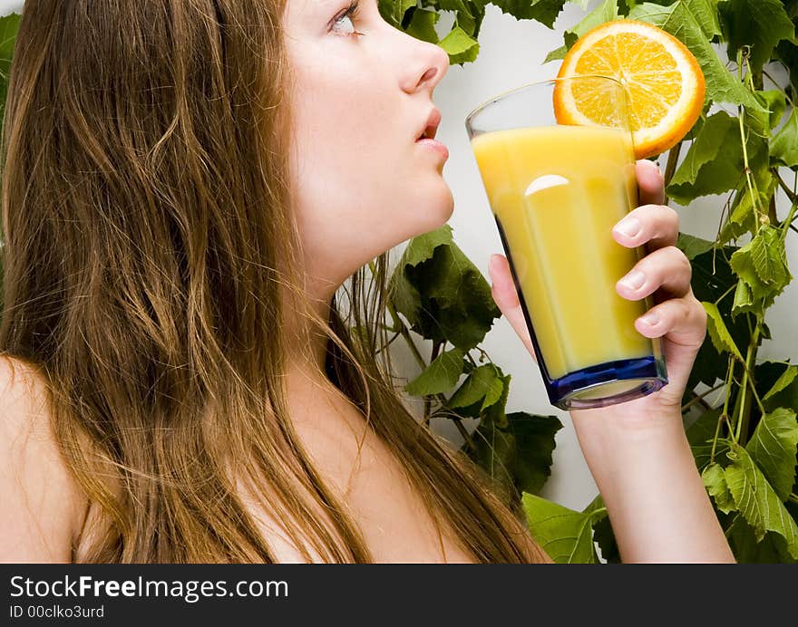 Beautiful young woman portrait with orange. Beautiful young woman portrait with orange