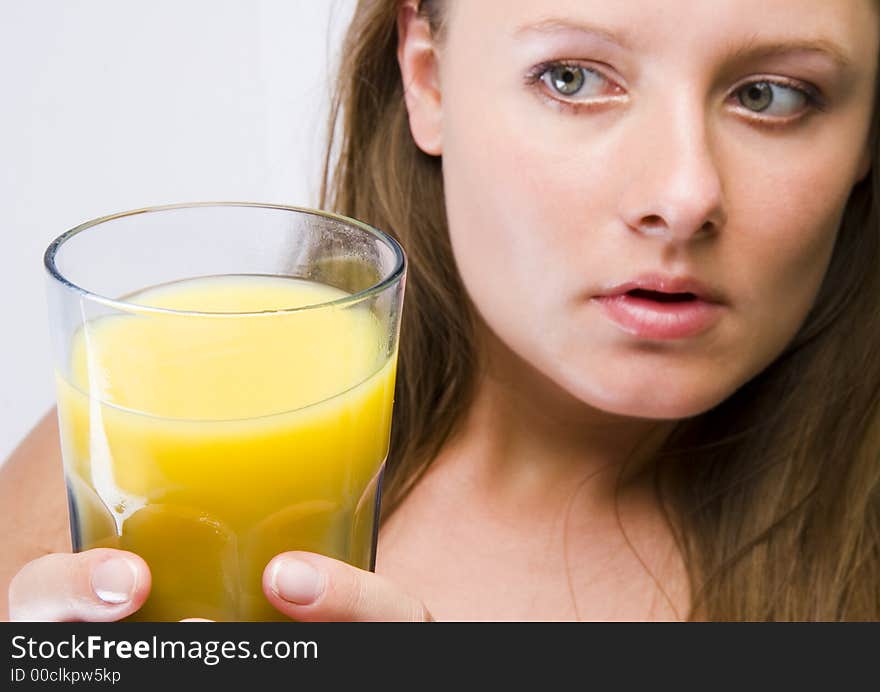 Beautiful young woman portrait with orange. Beautiful young woman portrait with orange