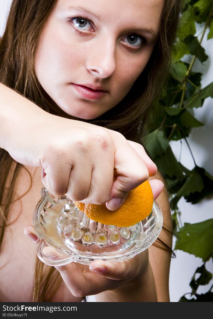 Beautiful young woman portrait with orange. Beautiful young woman portrait with orange