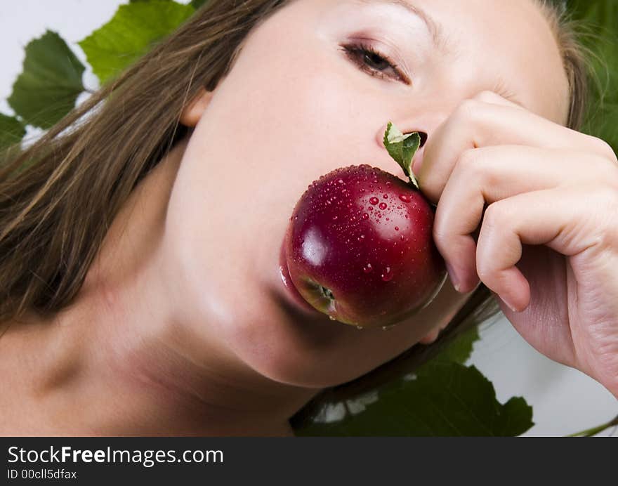 Beautiful young woman portrait with apple. Beautiful young woman portrait with apple