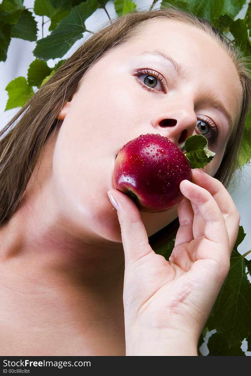 Beautiful young woman portrait with apple. Beautiful young woman portrait with apple