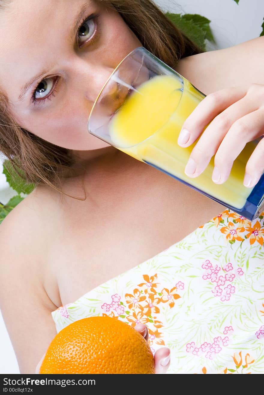 Beautiful young woman portrait with orange. Beautiful young woman portrait with orange