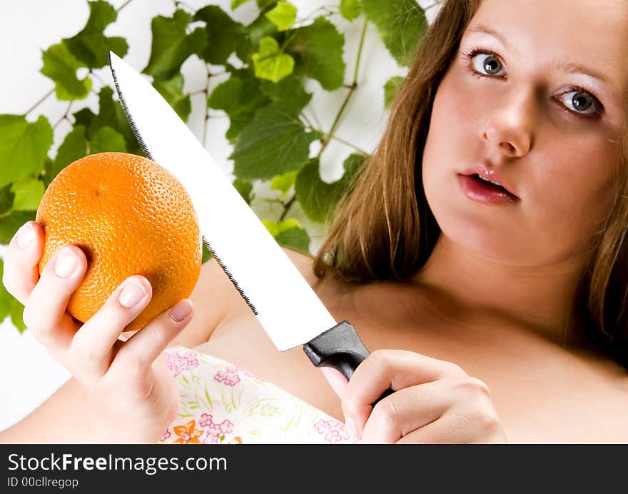 Beautiful young woman portrait with orange. Beautiful young woman portrait with orange