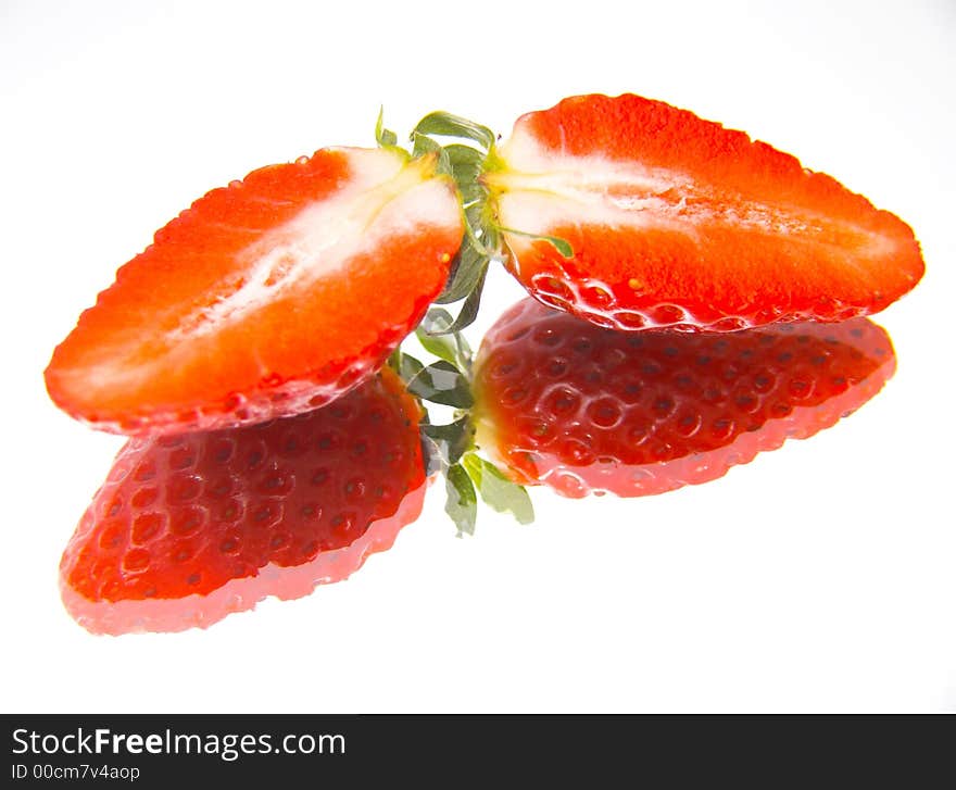 Cut strawberry close up isolated on white. Cut strawberry close up isolated on white