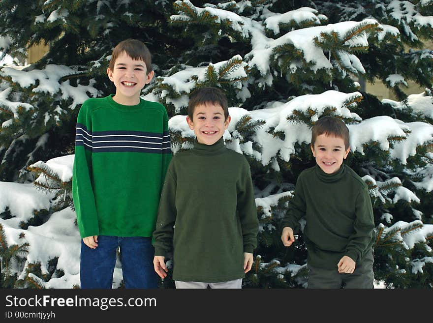 Three Boys having fun outside in the cold. Three Boys having fun outside in the cold