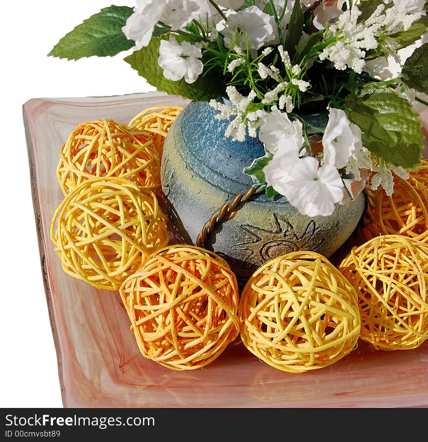 Vase on the plate with flowers and decoration. Vase on the plate with flowers and decoration