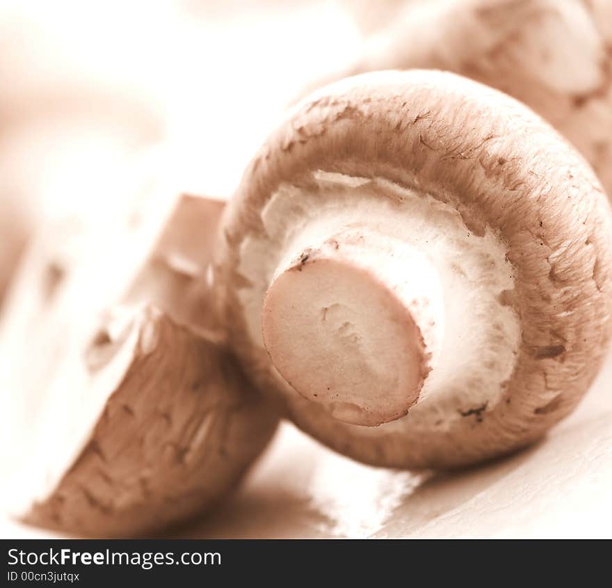 Organic Mushrooms, closed cap against a white background