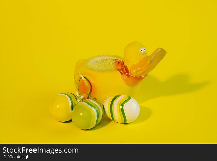 Painted easter egg with ducks yellow background. Painted easter egg with ducks yellow background