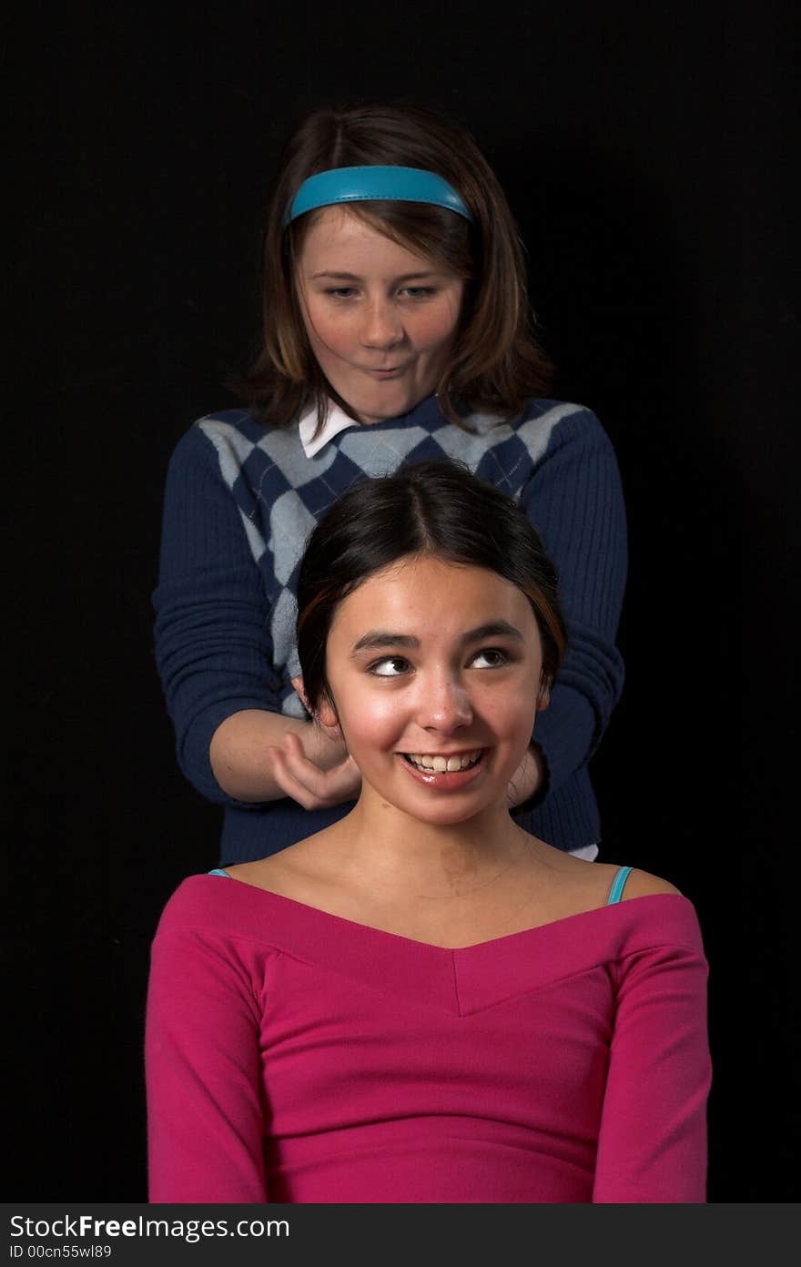 Teen posing and improvising over black backdrop. Teen posing and improvising over black backdrop