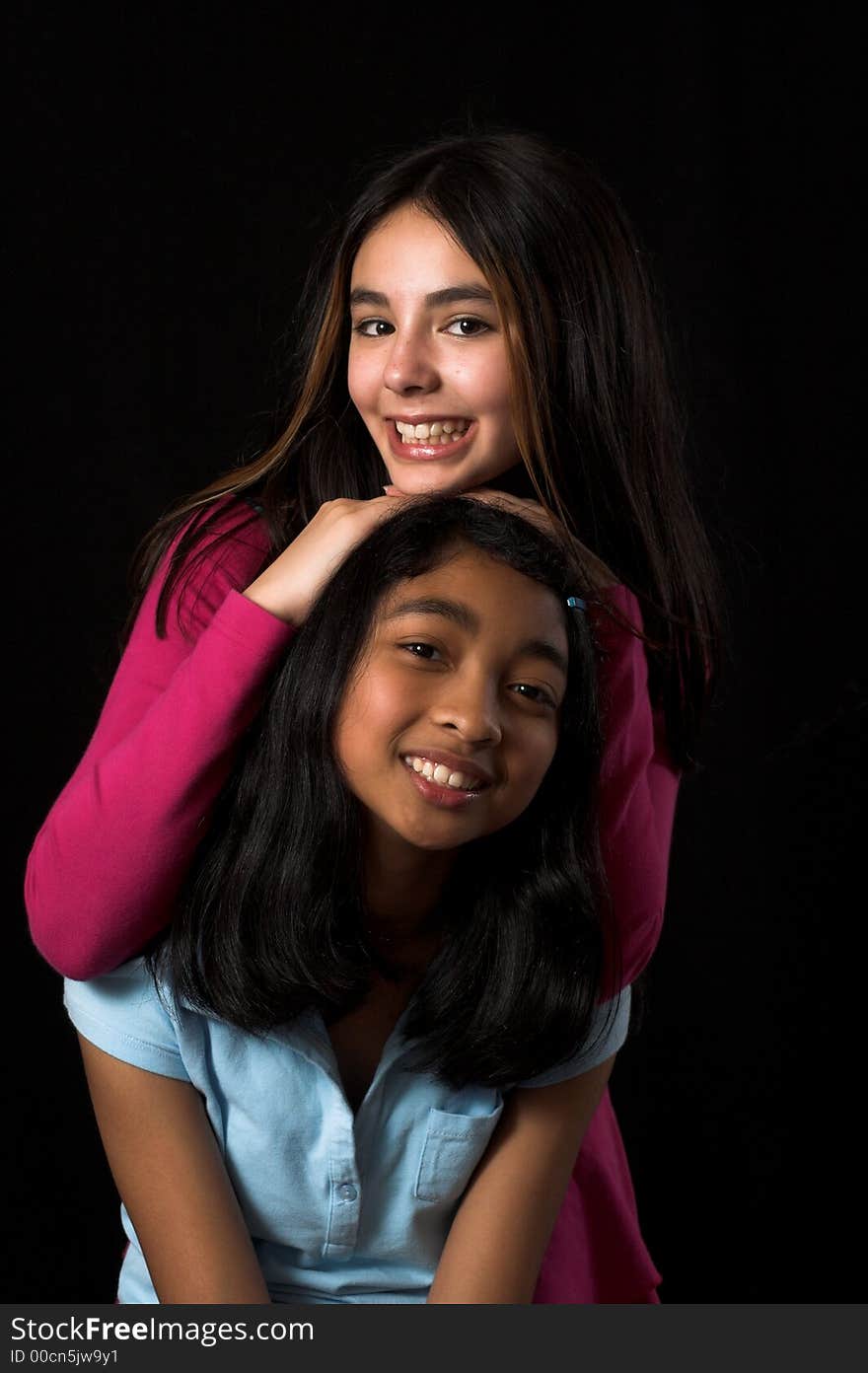 Teen posing and improvising over black backdrop. Teen posing and improvising over black backdrop