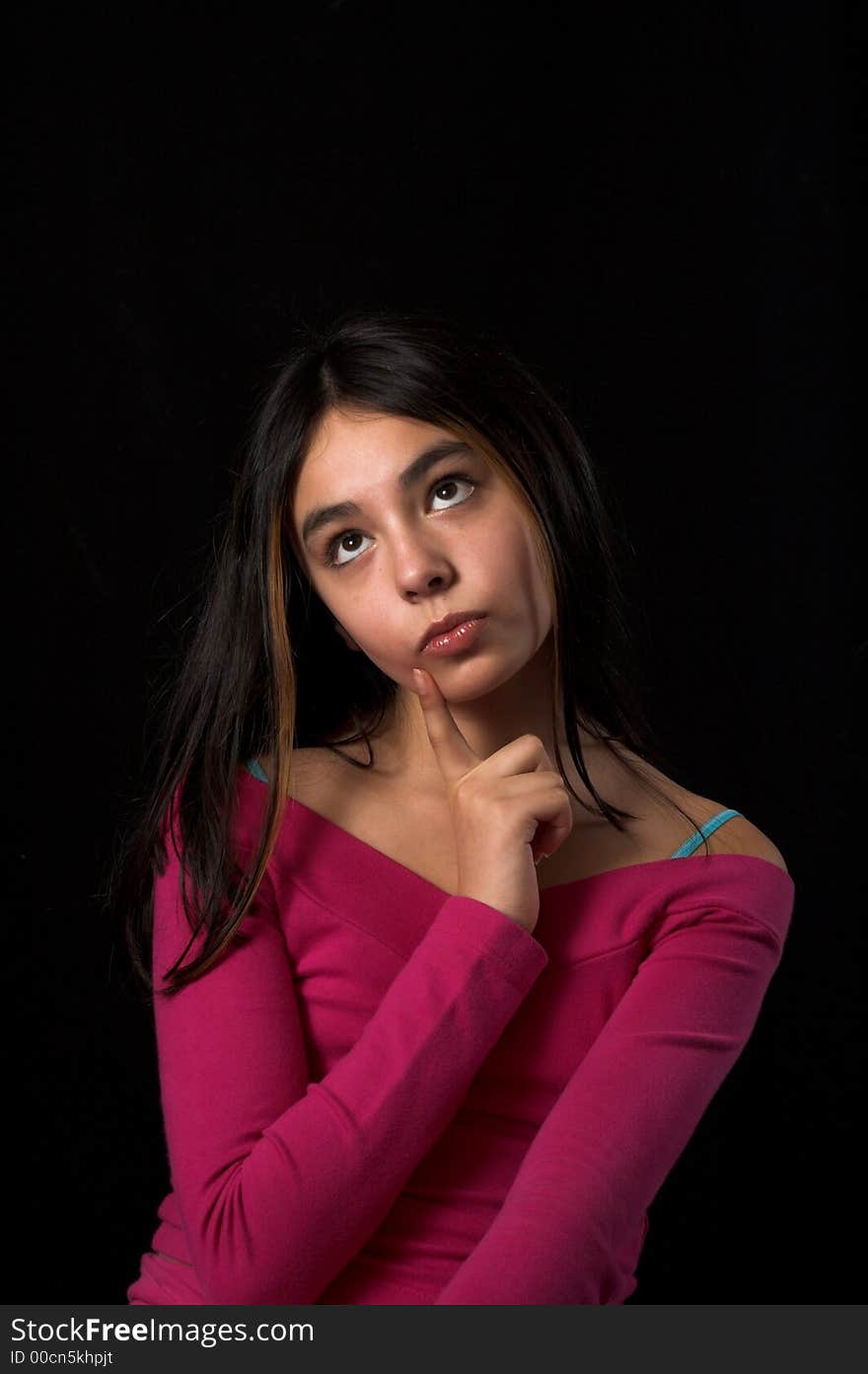 Teen Posing Over Black Backdrop