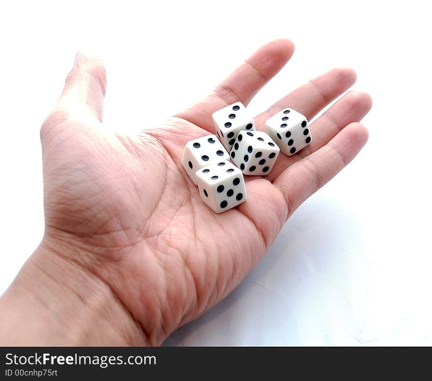 Five white dices on a hand with white background