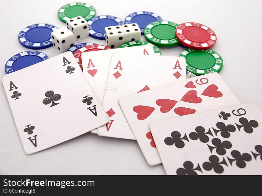 Five full house cards with chips and dice at the background