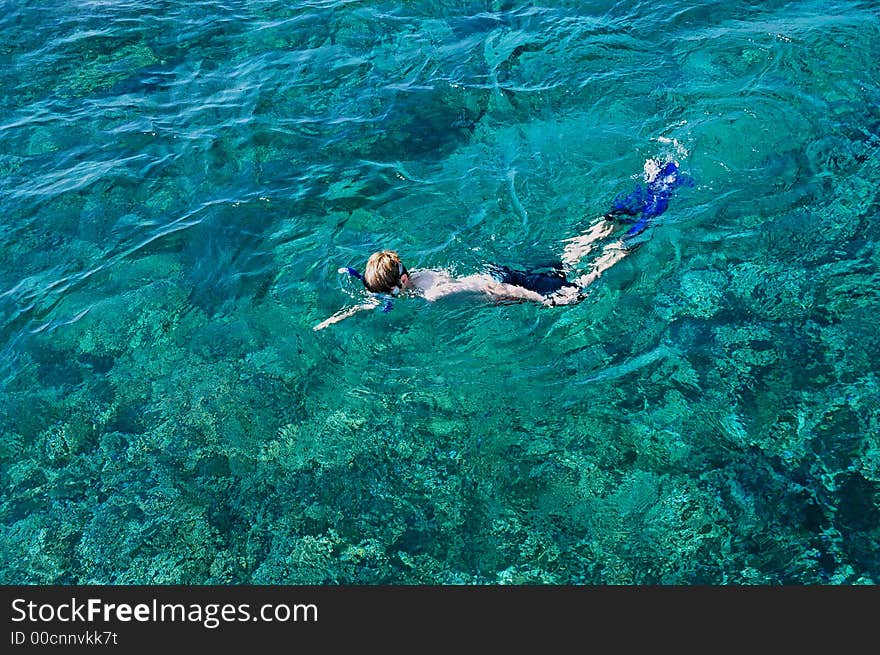 Boy snorkelling in the ocean