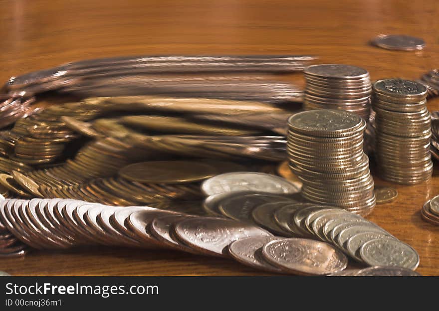 Set of coins and curve mirror, (studio, halogen light). Set of coins and curve mirror, (studio, halogen light).