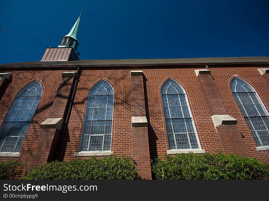 Exterior of an old Lutheren church in charleston south carolina with blue sky as background. Exterior of an old Lutheren church in charleston south carolina with blue sky as background
