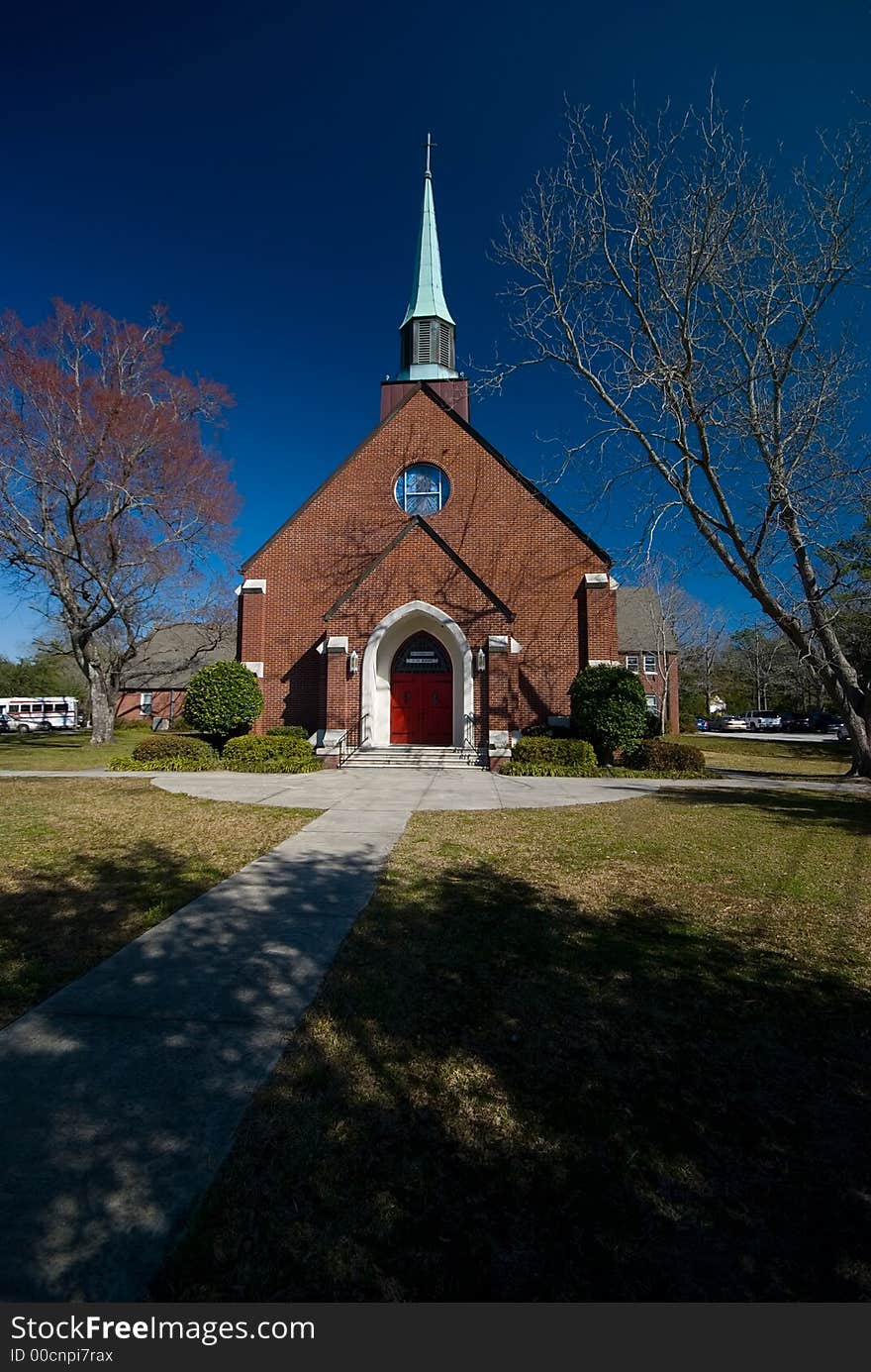 Exterior of an old Lutheren church in charleston south carolina with blue sky as background. Exterior of an old Lutheren church in charleston south carolina with blue sky as background