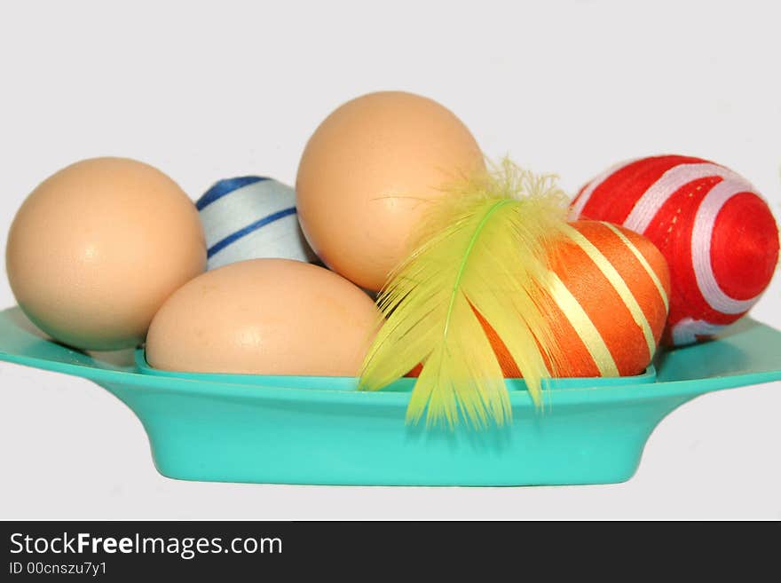 Colorful easter eggs  and white eggs