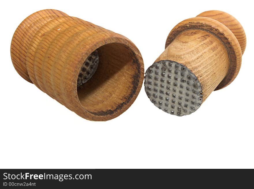 Wooden mortar with pestle isolated on white