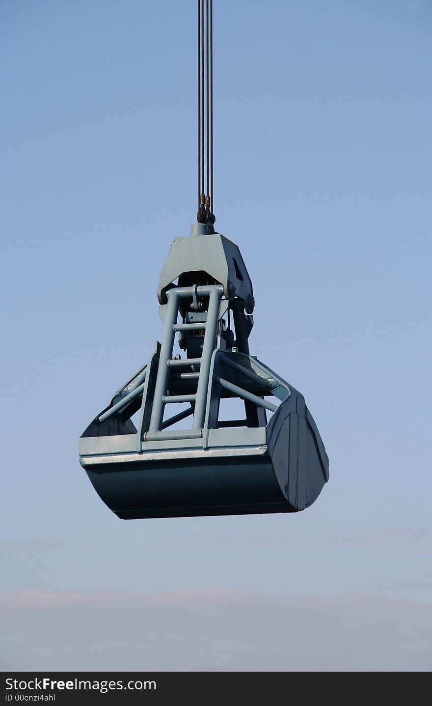 Crane bucket hanging in the air